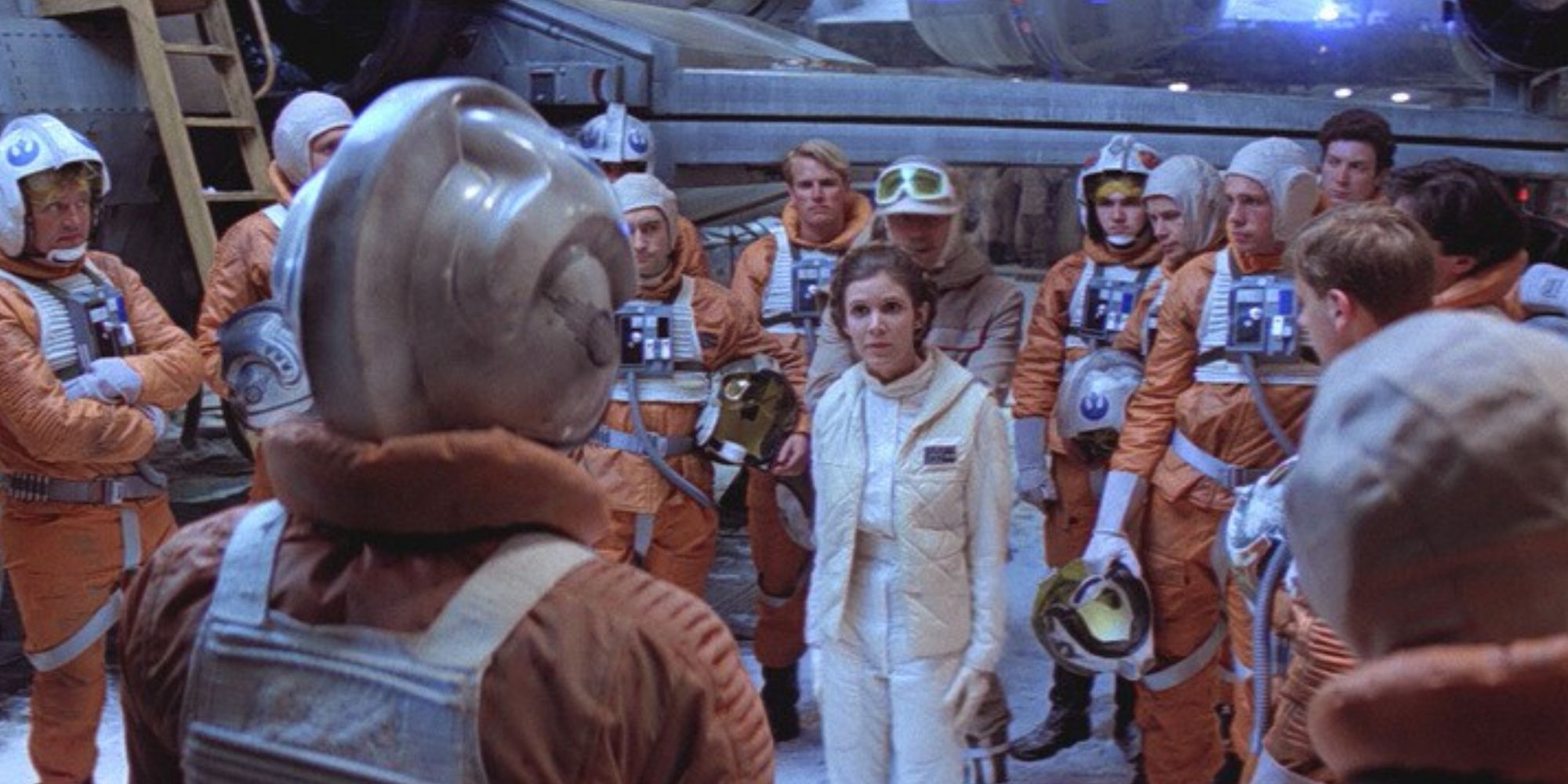 Carrie Fisher as Princess Leia standing among the X-Wing pilots in Star Wars: Episode V - The Empire Strikes Back