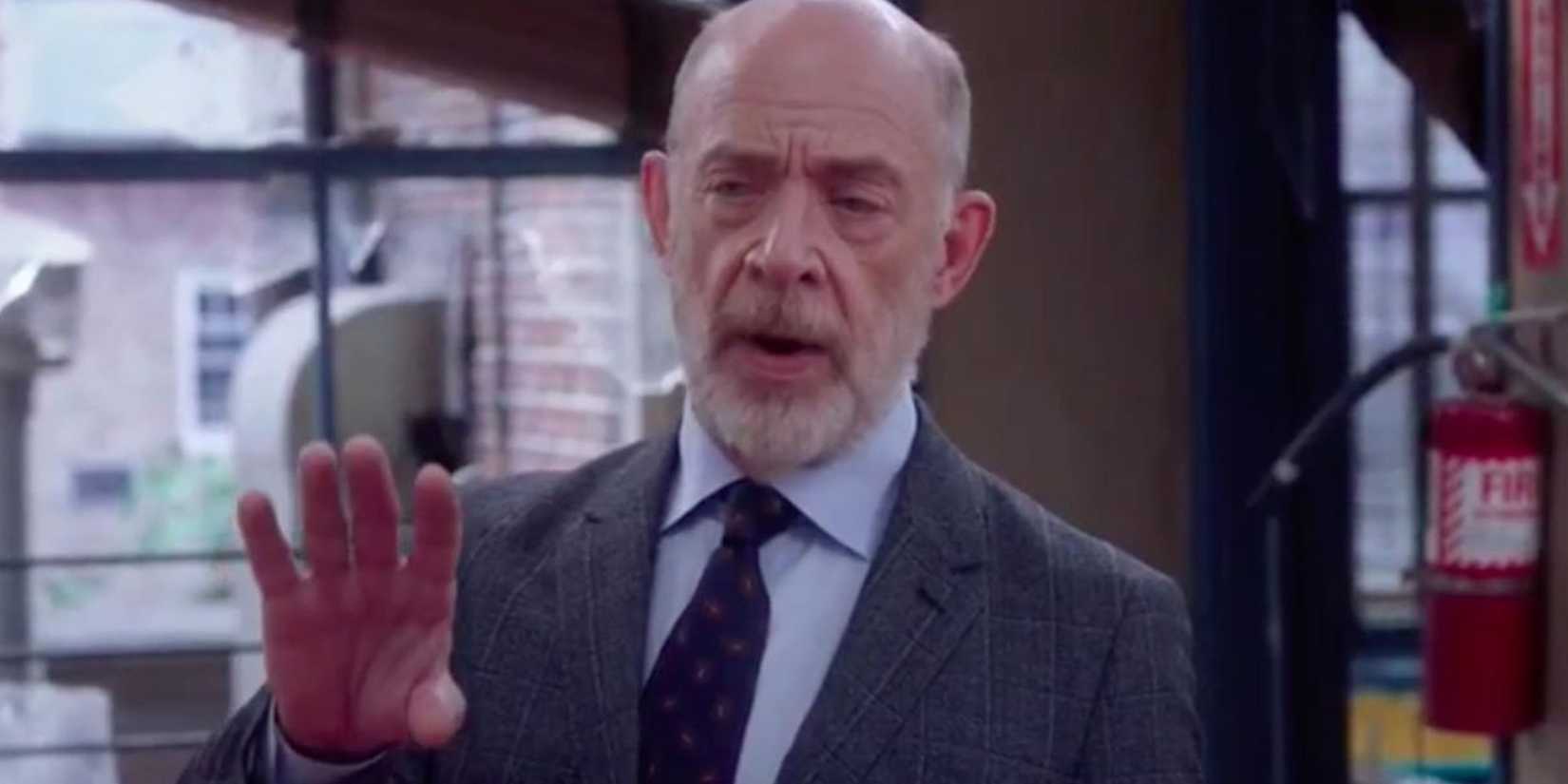 J.K. Simmons as Frank Dillman holding his hand out in front of him in Brooklyn Nine-Nine