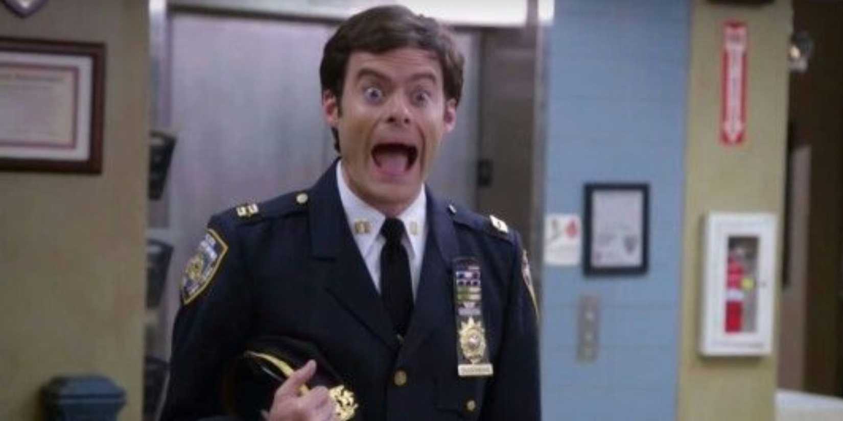 Bill Hader as Captain Seth Dozerman laughing at something in Brooklyn Nine-Nine.