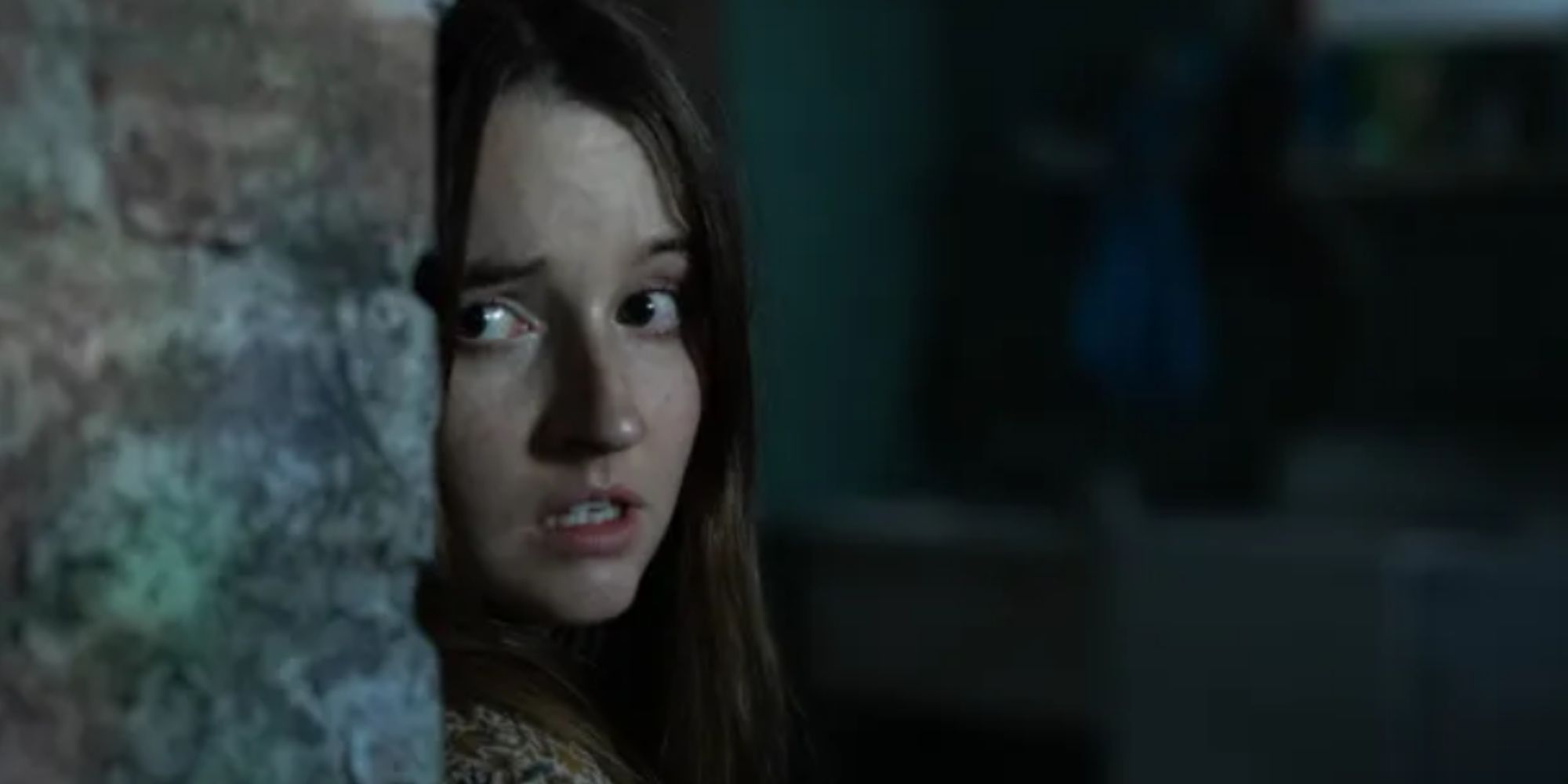Kaitlyn Dever looking scared as Brynn Adams in No One Will Save You