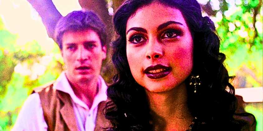 Morena Baccarin as Inara Serra in Firefly in the foreground as Nathan Fillion's Malcolm Reynolds cowers in the background