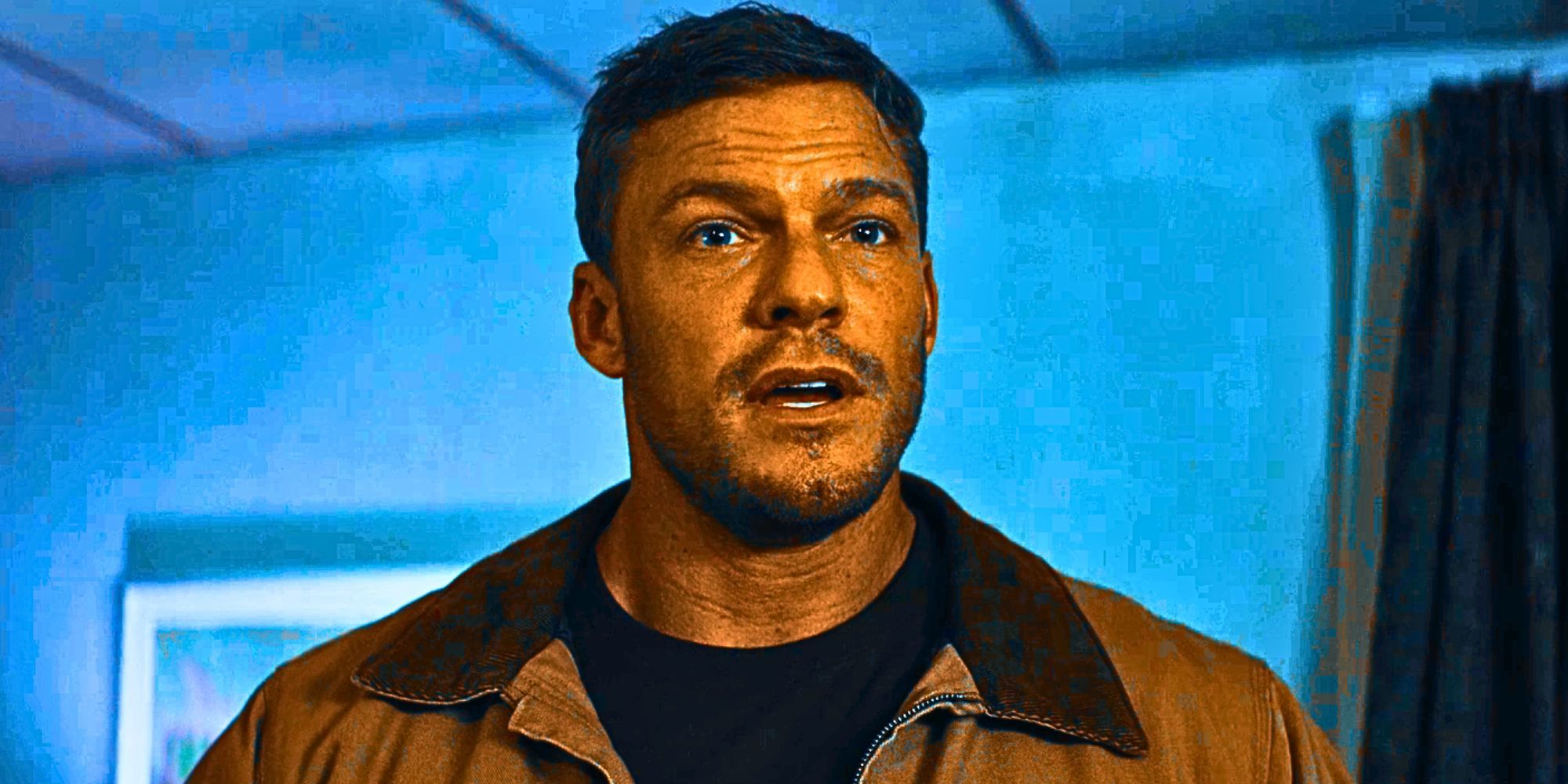 Alan Ritchson looking shocked as Reacher