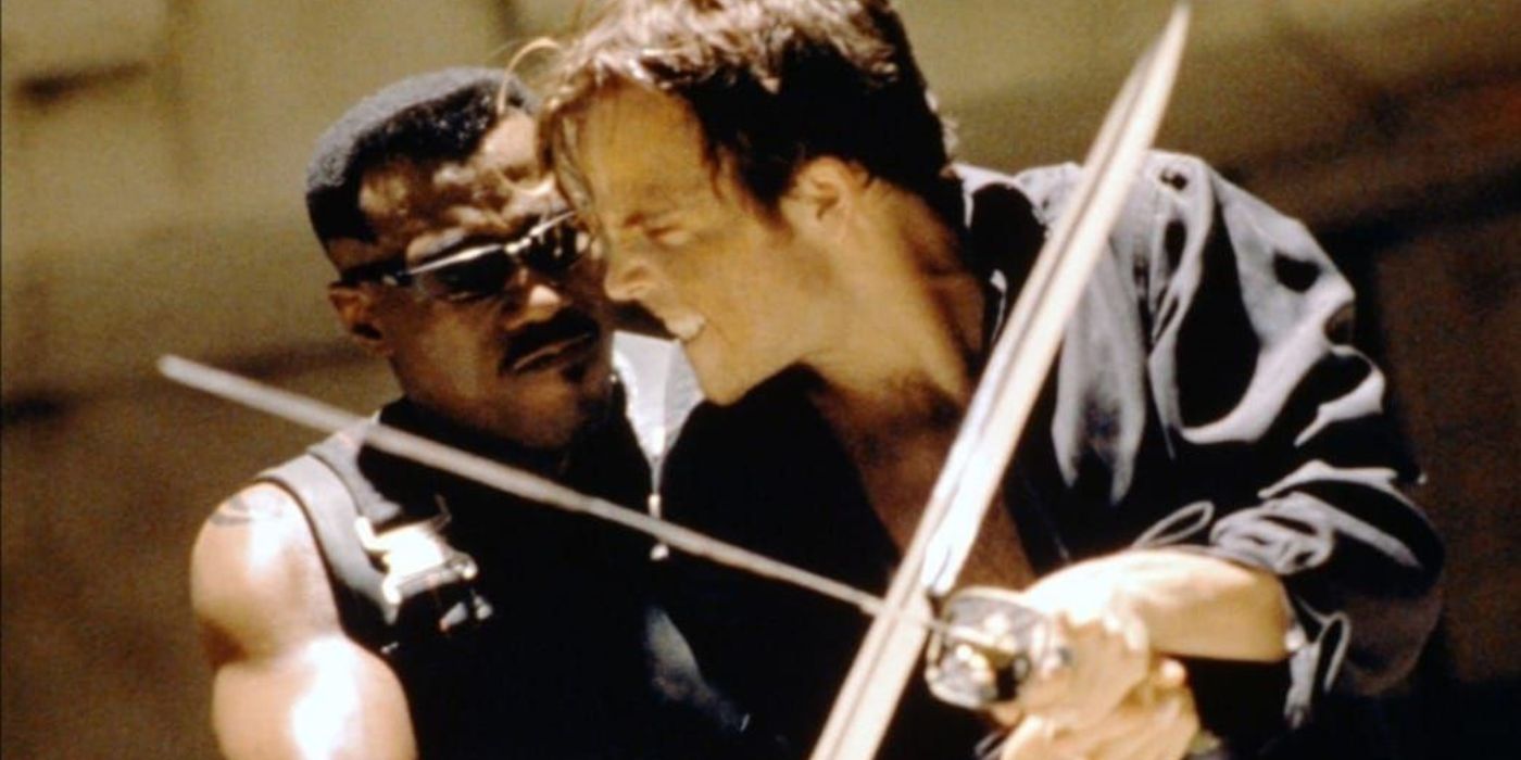 Wesley Snipes as Blade fights against Stephen Dorff as Deacon Frost in Blade.