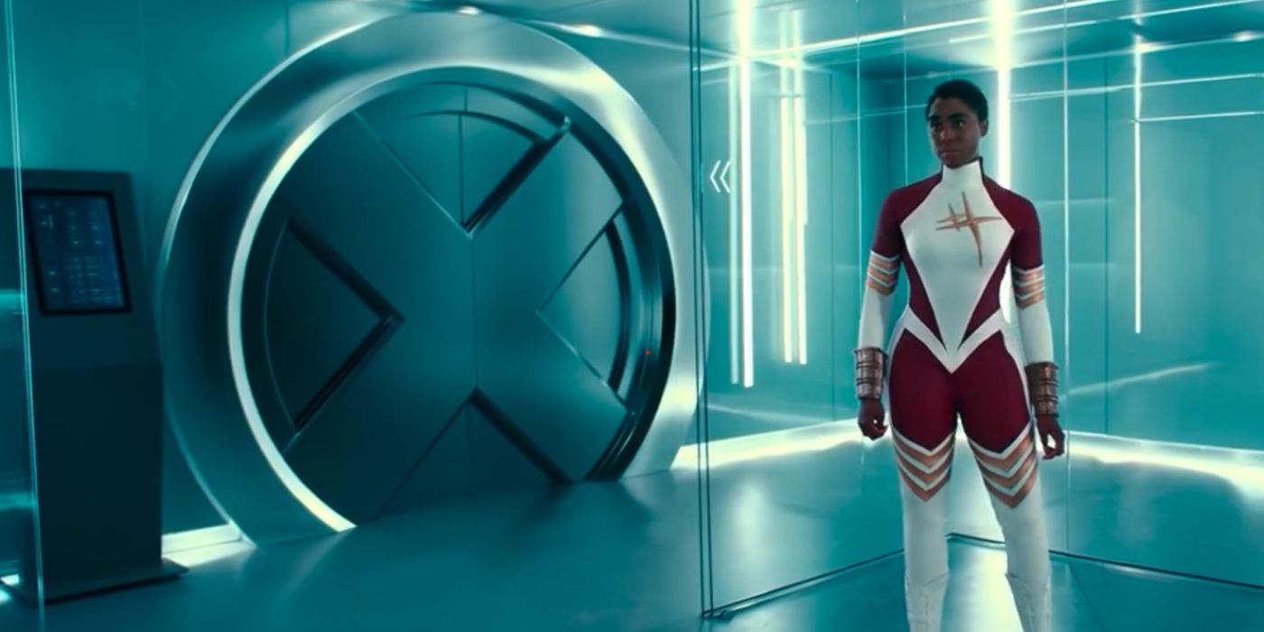 Maria Rambeau in her Binary costume stands next to the X-Men door.