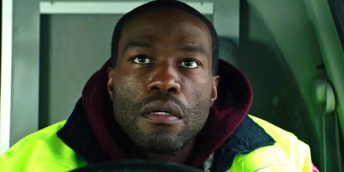 Yahya Abdul-Mateen II leaning forward over the driver's wheel in Ambulance