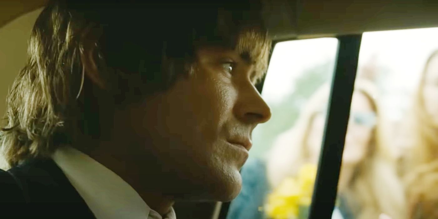 Zac Efron looking out a car window as Kevin Von Erich in The Iron Claw