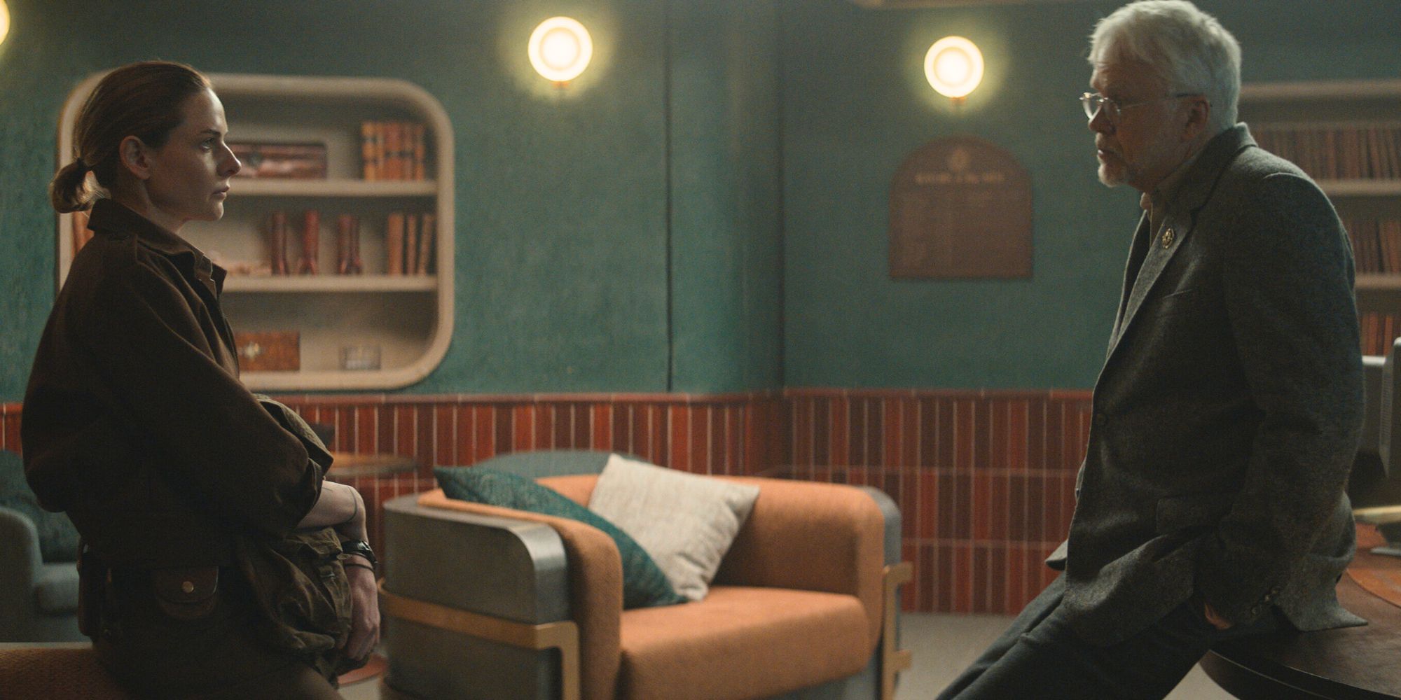 Rebecca Ferguson as Juliette Nichols talking to Tim Robbins as Bernard Holland in Silo