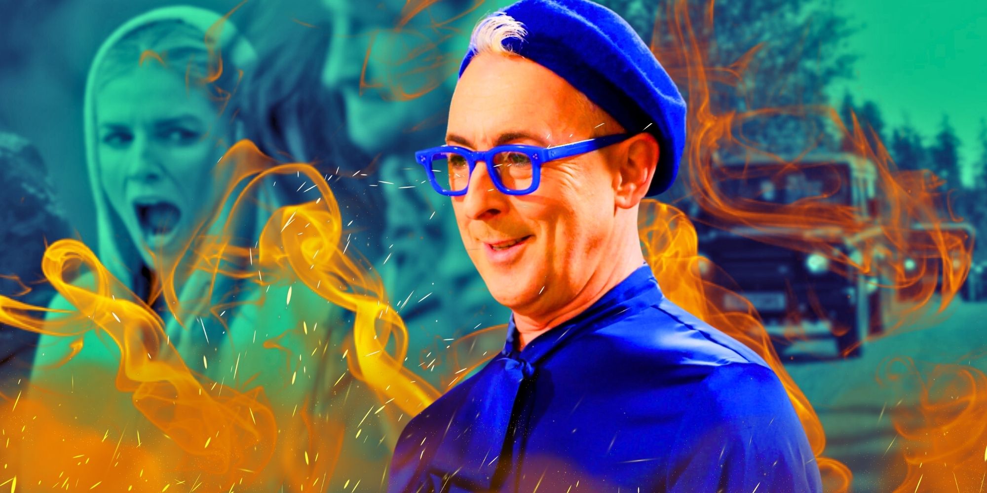 The Traitors US host Alan Cumming wearing blue and smiling