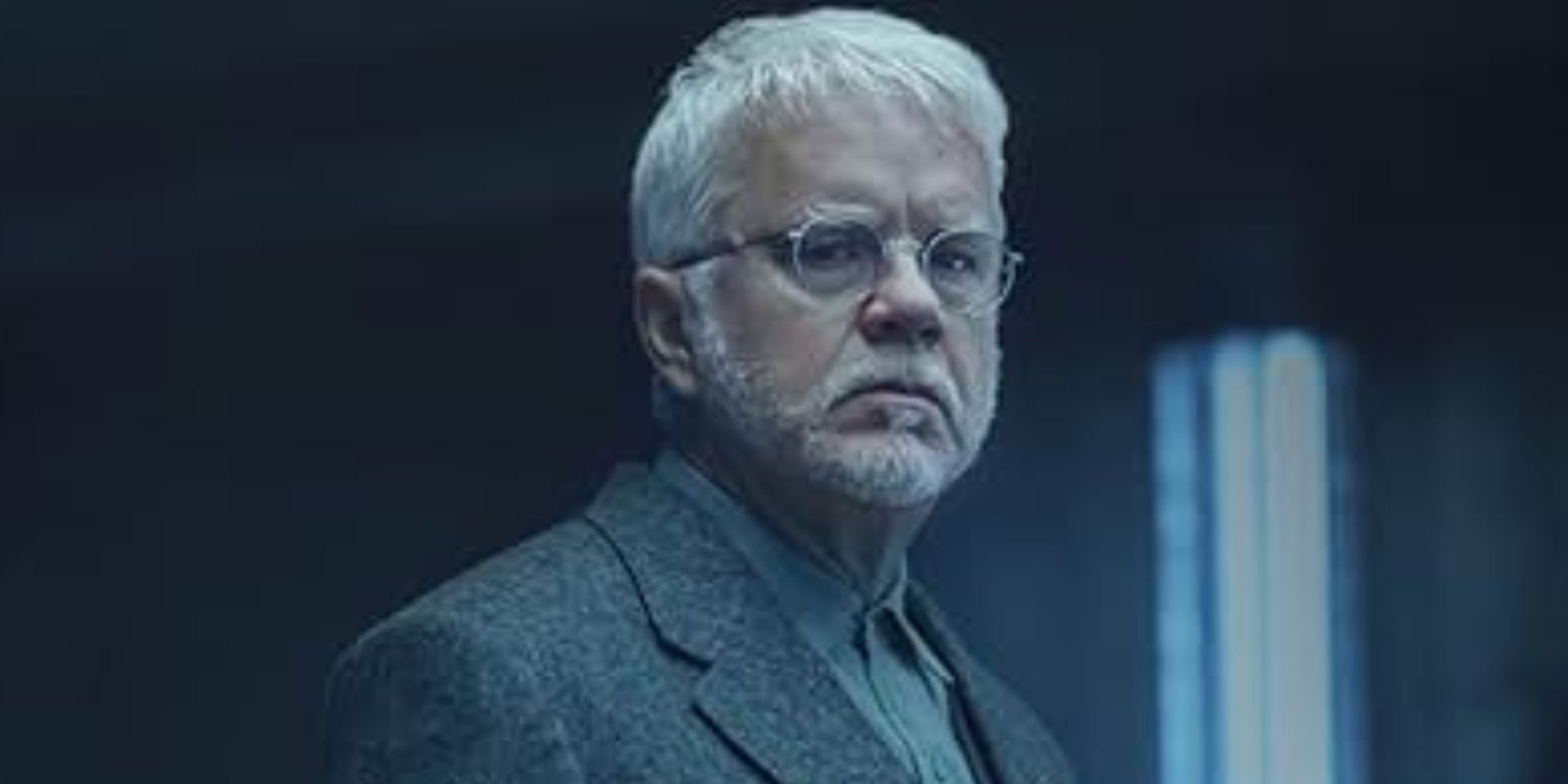 Tim Robbins looking serious as Bernard Holland in Silo