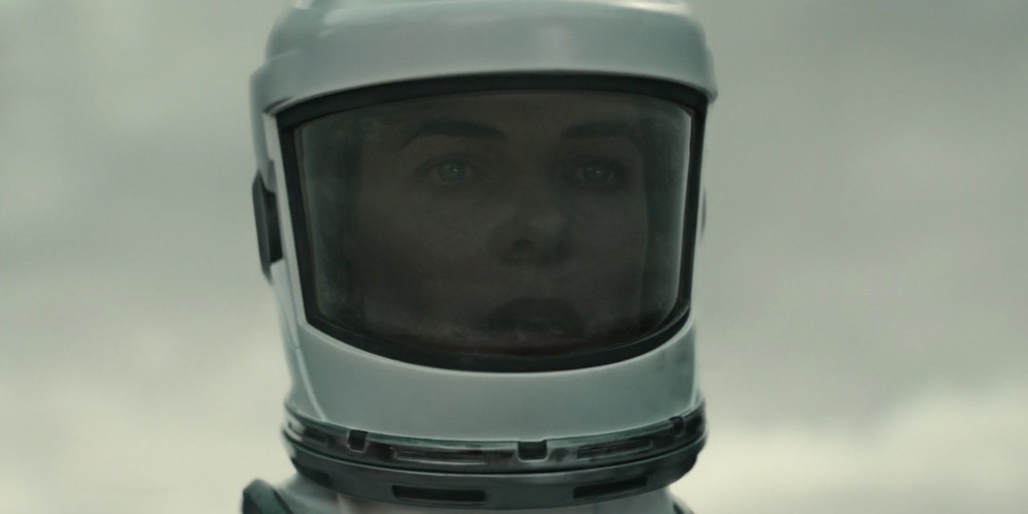 Rebecca Ferguson as Juliette Nichols in an environment suit looking shocked in Silo