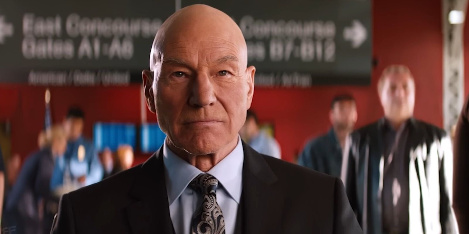 Patrick Stewart at an airports as Charles Xavier in The Wolverine