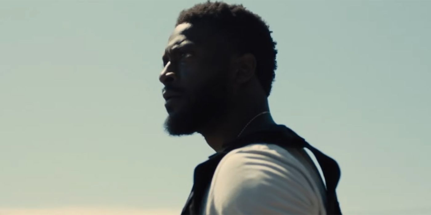 Aldis Hodge looking towards the horizon in Marmalade