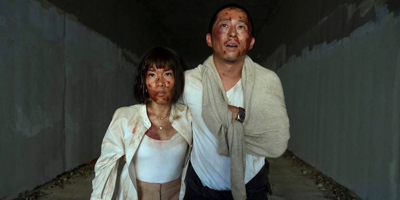 Amy and Danny walking out of a tunnel in Beef