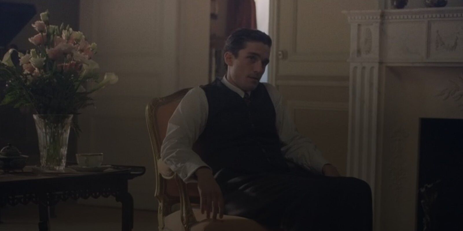André Sitting In A Chair In The New Look.jpg