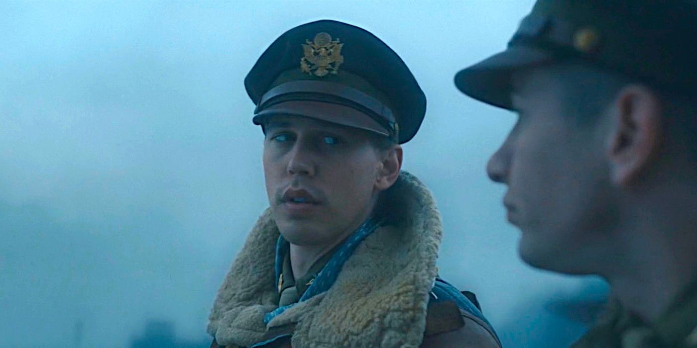 Austin Butler dressed in WW2 bomber jacket and hat gazing to the left at his conversation partner in a scene from Masters of the Air