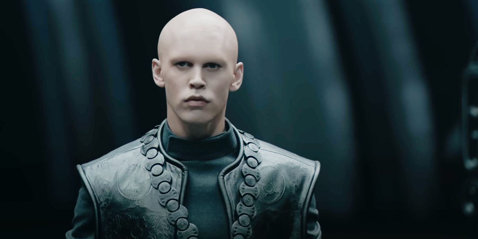 Austin Butler's Feyd-Rautha standing with stern look on his face in Dune_ Part Two