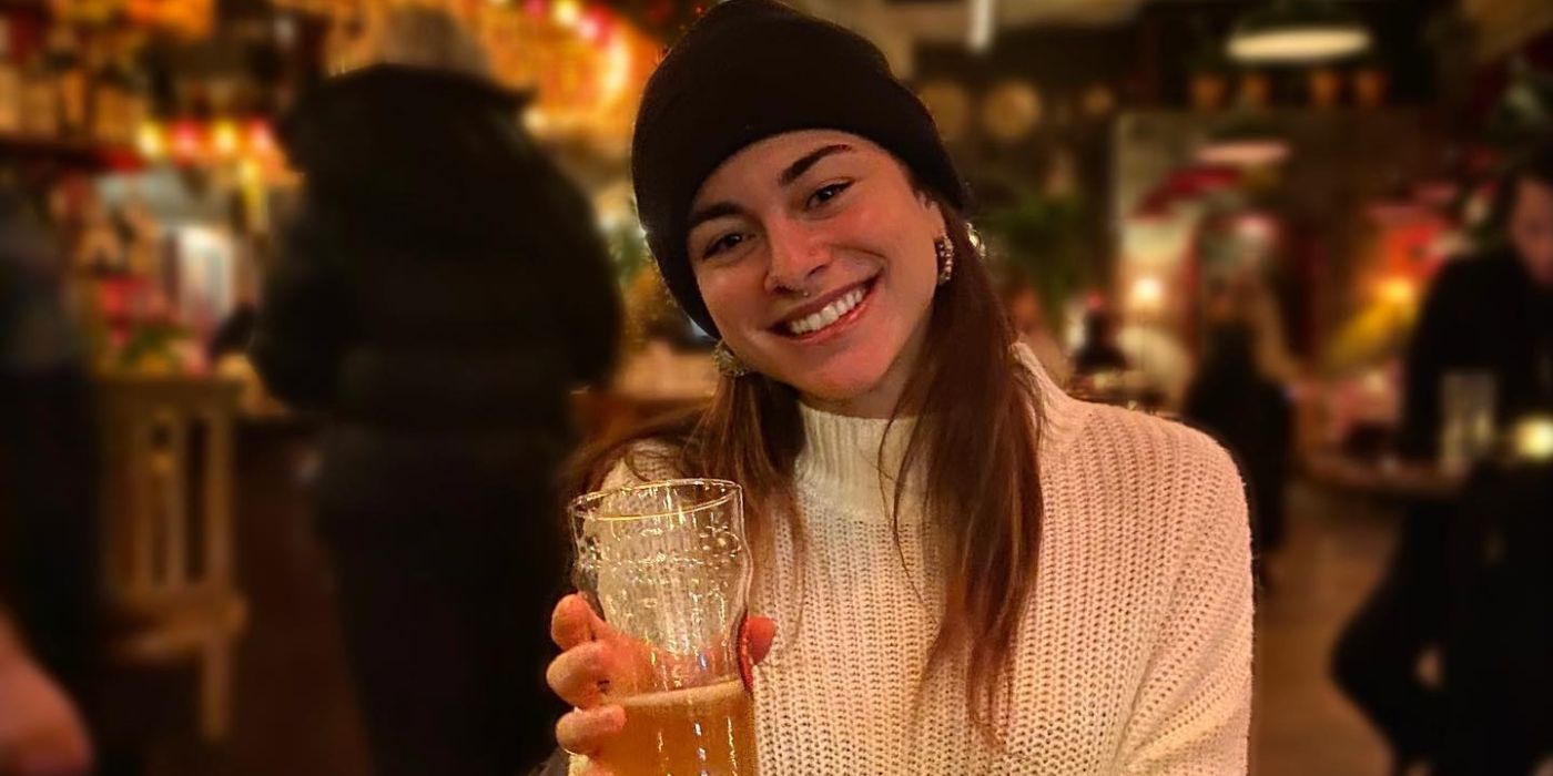 Below Deck Marie Marquis Instagram Post where she si holding a beer and smiling