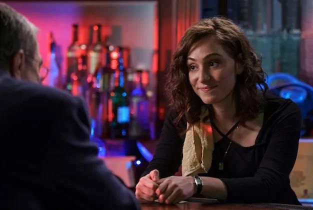 Simone Policano talking to Tom Selleck at a bar in Blue Bloods 