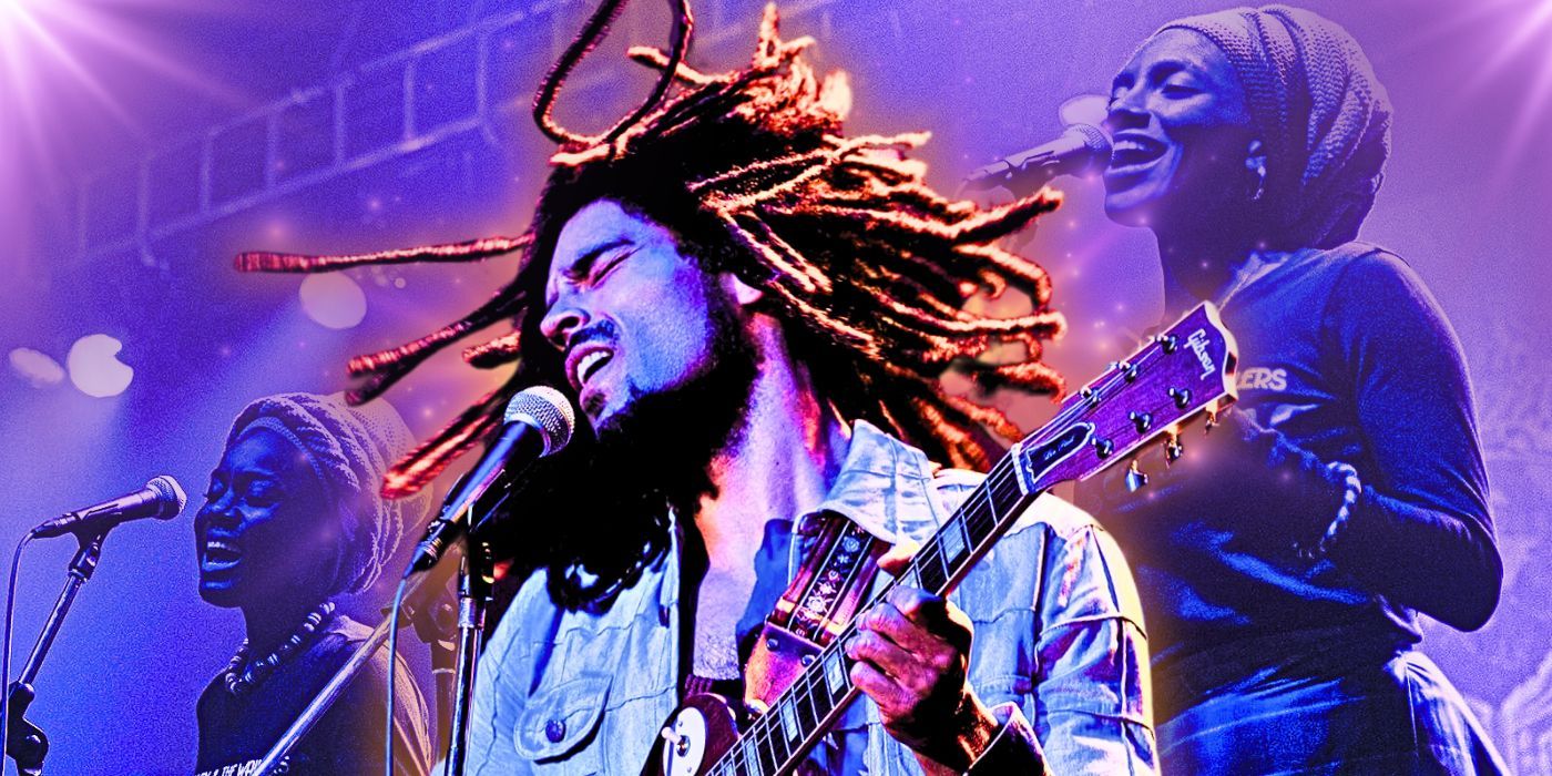 Kingsley Ben-Adir as Bob Marley singing with background singers in Bob Marley: One Love