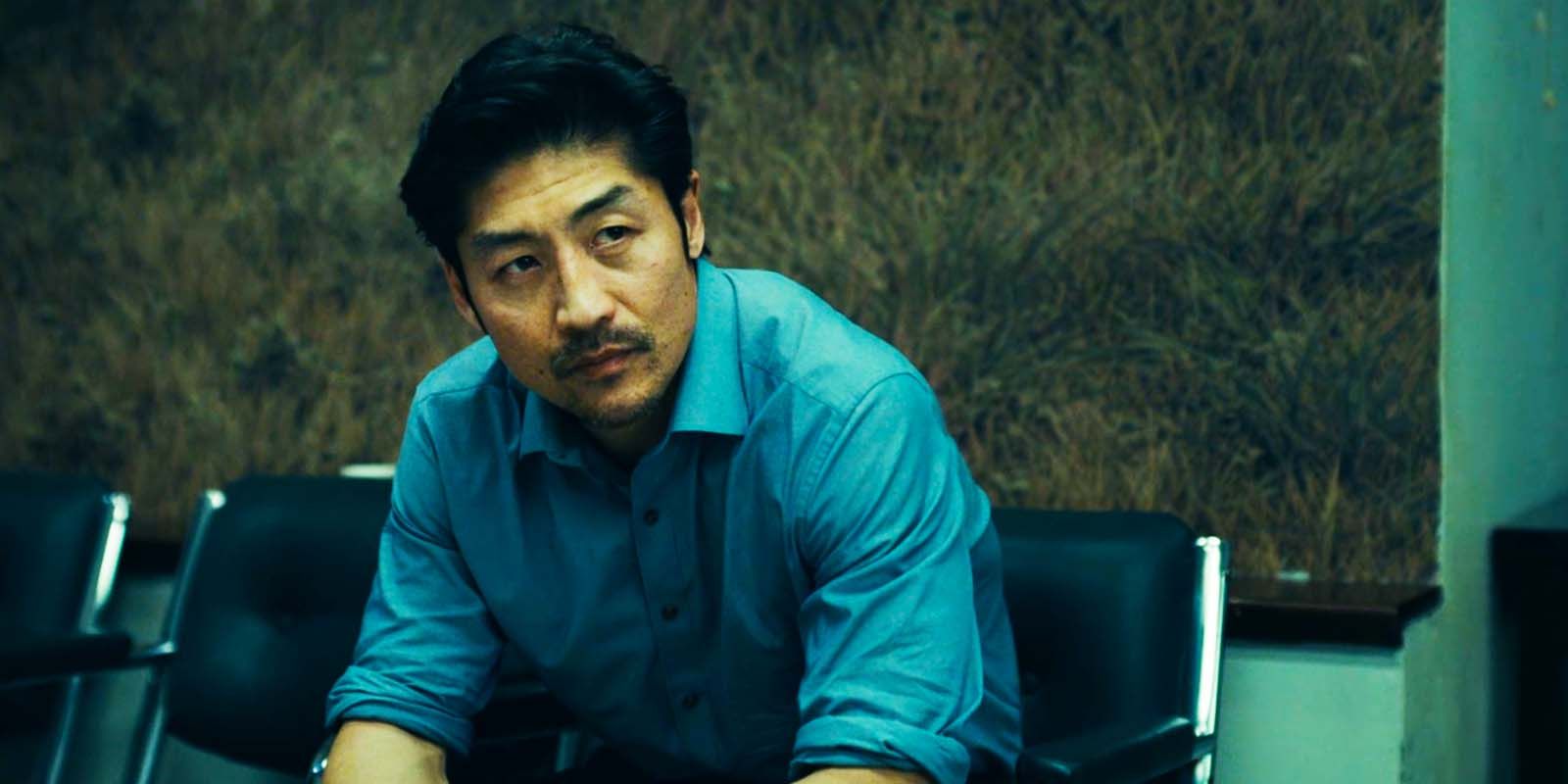 Brian Tee as Clarke in Expats episode 4