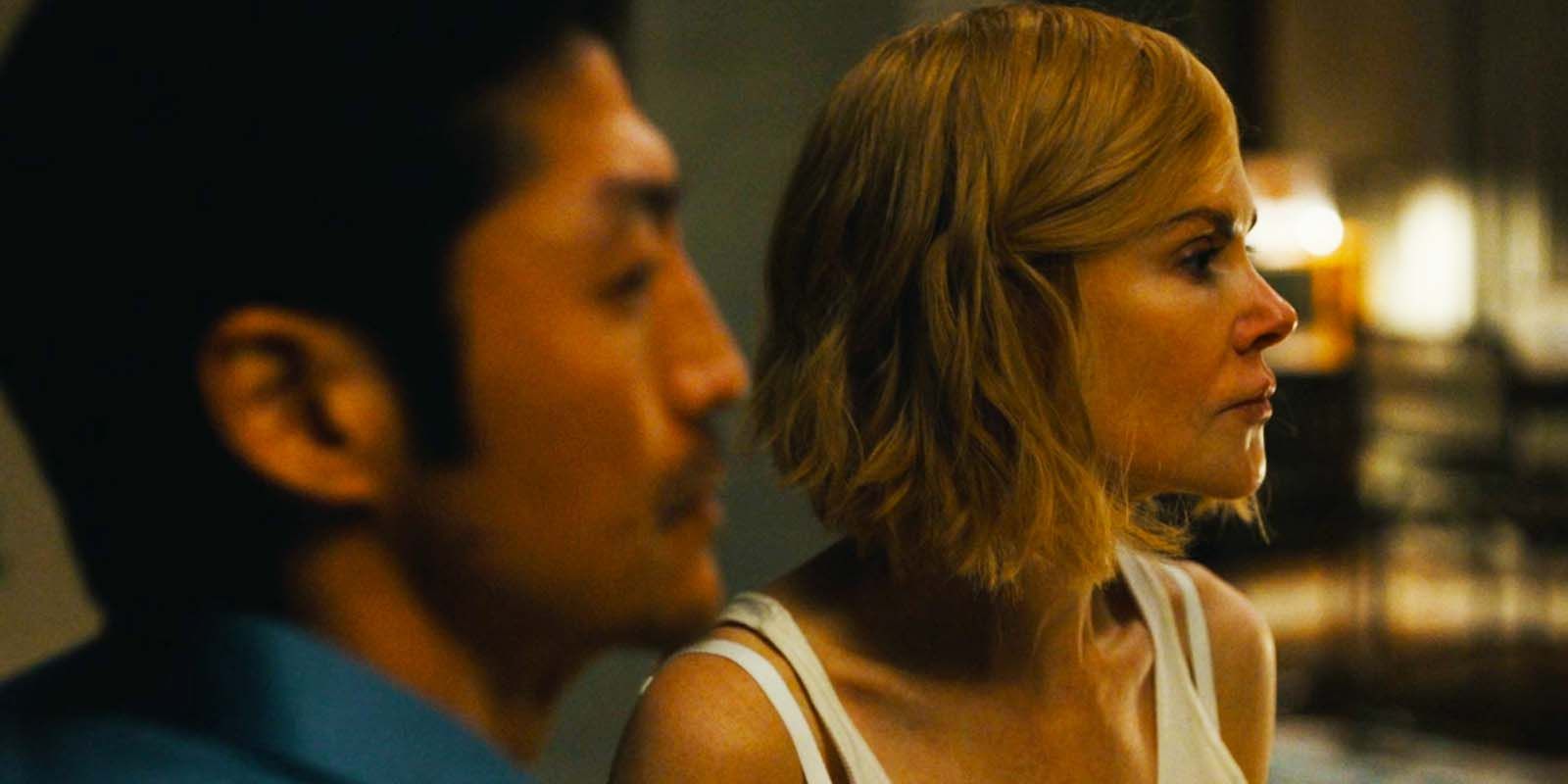 Brian Tee as Clarke Woo and Nicole Kidman as Margaret in Expats episode 3