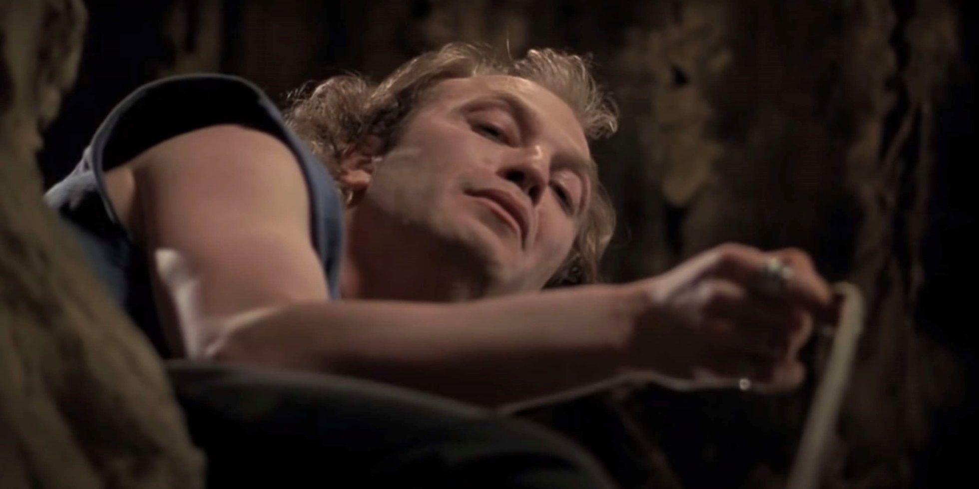 Ted Levine as Buffalo Bill looking into the well in The Silence of the Lambs