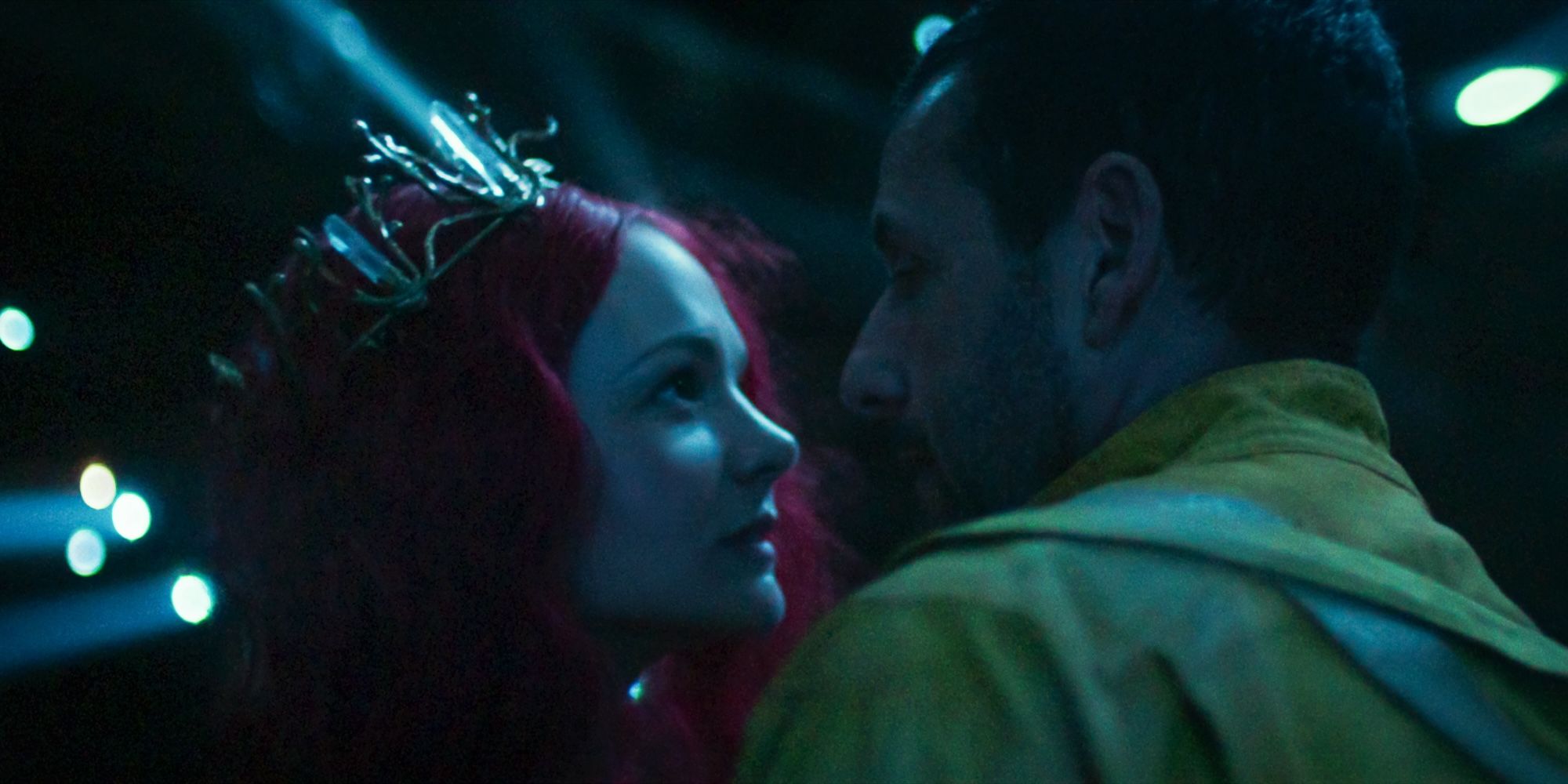 Carey Mulligan and Adam Sandler stand intimately close together in Spaceman