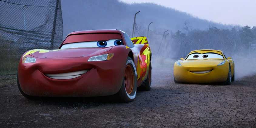 Lightning smiles as he looks back at Cruz in Cars 3