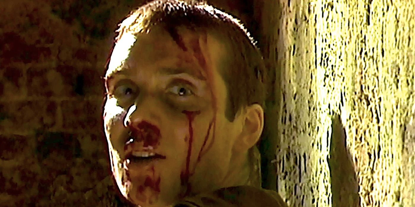 Cillian Murphy's bloodsoaked Jim looks over his shoulder in 28 Days Later