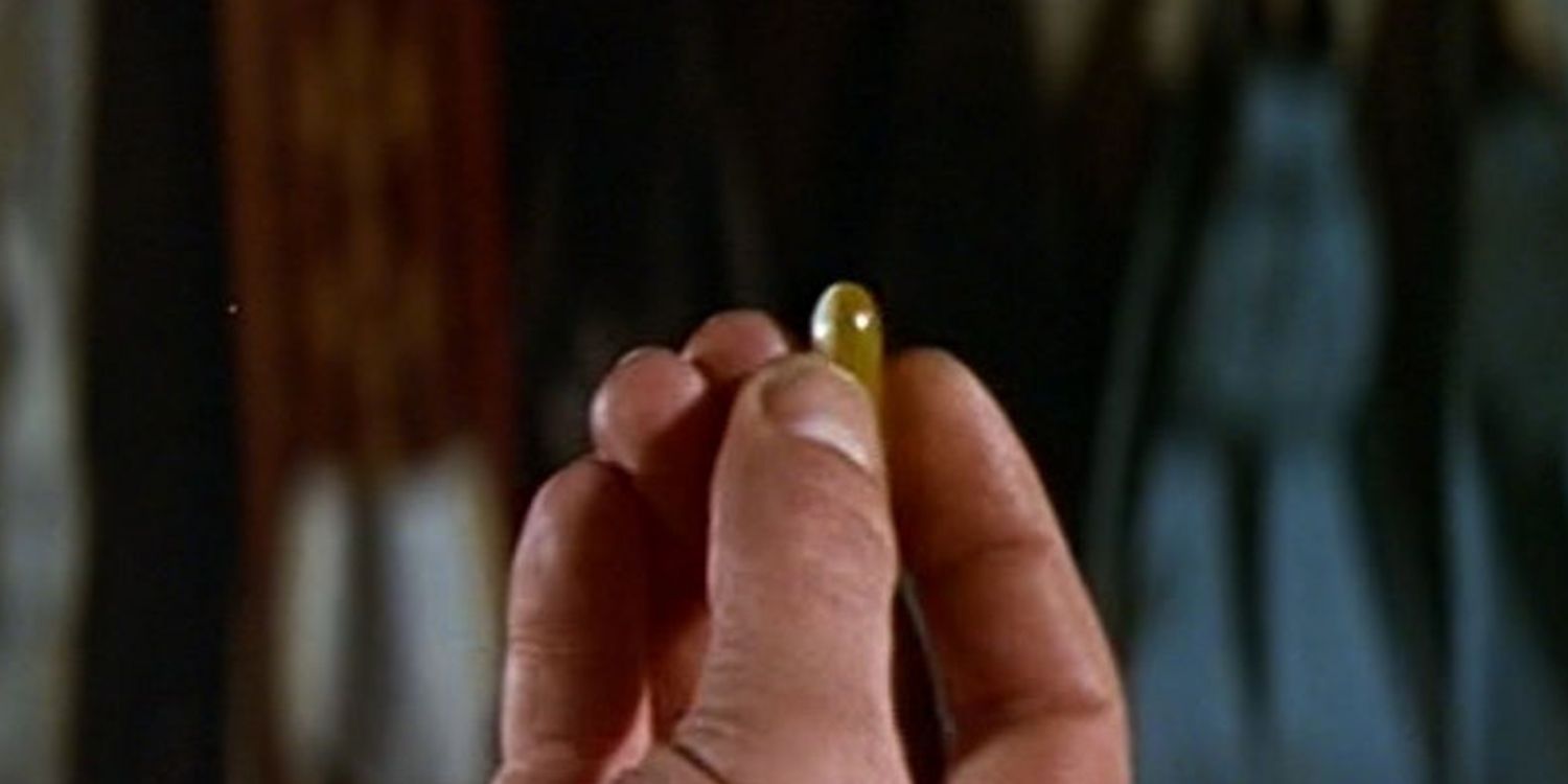 Closeup of James Bond's (Sean Connery) hand holding the radioactive tracer pill in Thunderball.