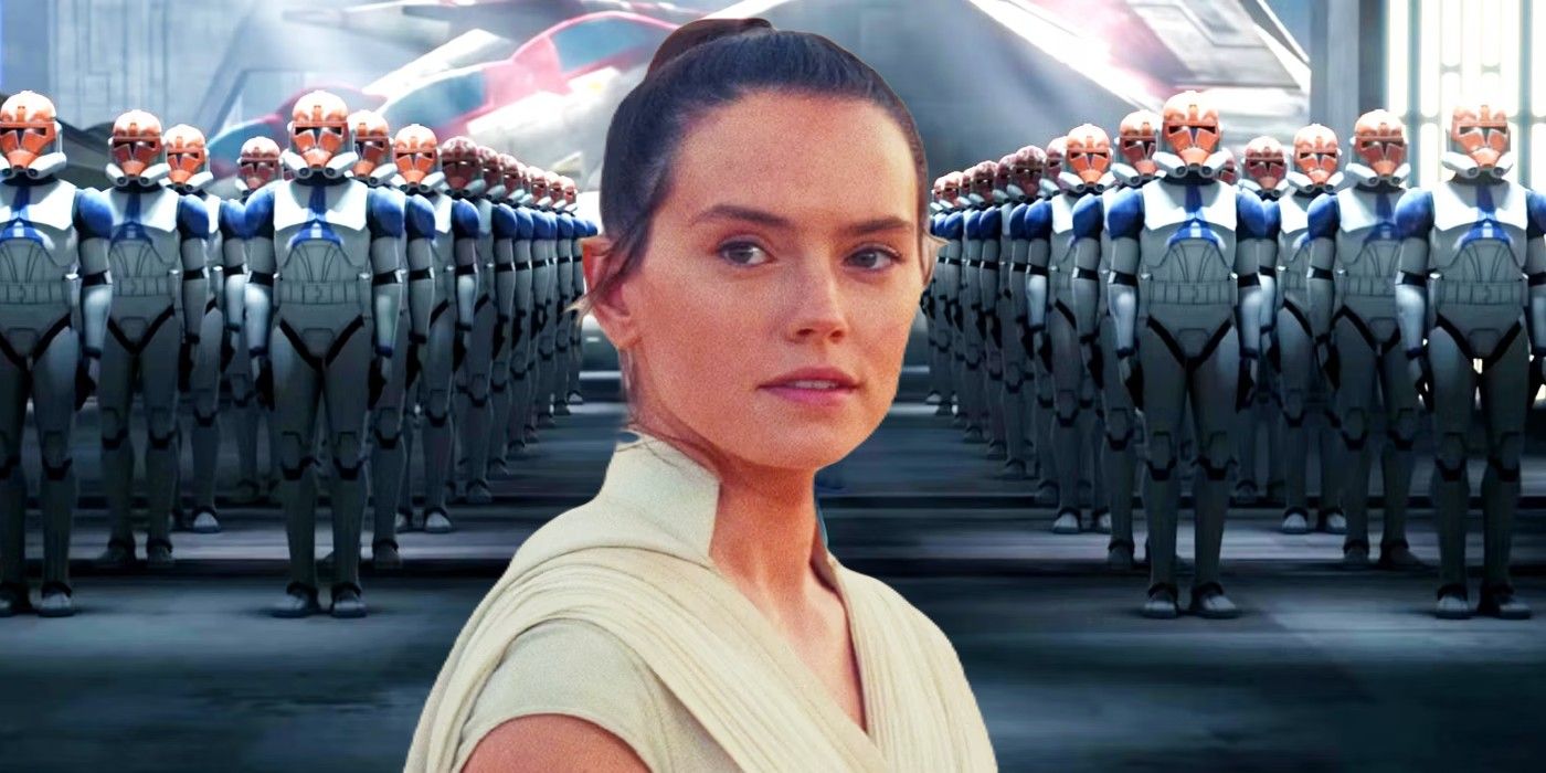 Rey (Daisy Ridley) standing in front of a group of animated clones wearing red helmets in Star Wars