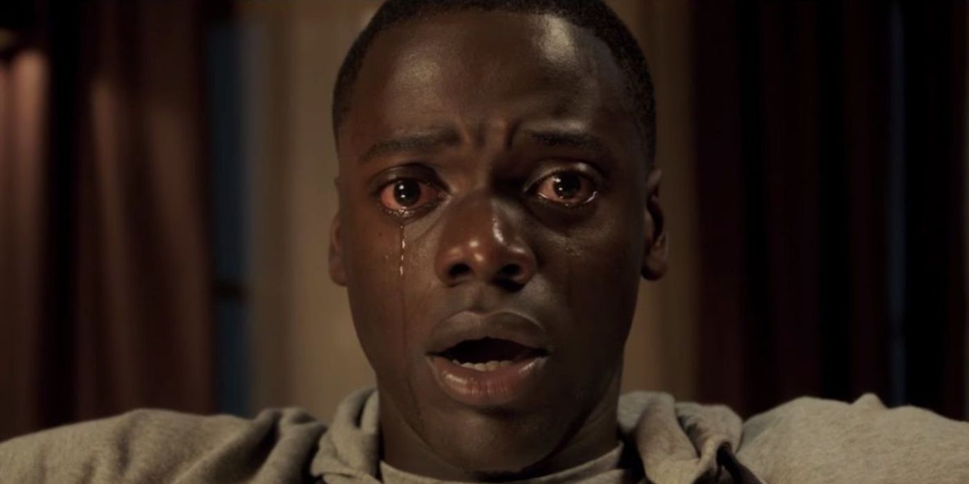Daniel Kaluuya as Chris cries during the sunken place scene from Get Out.