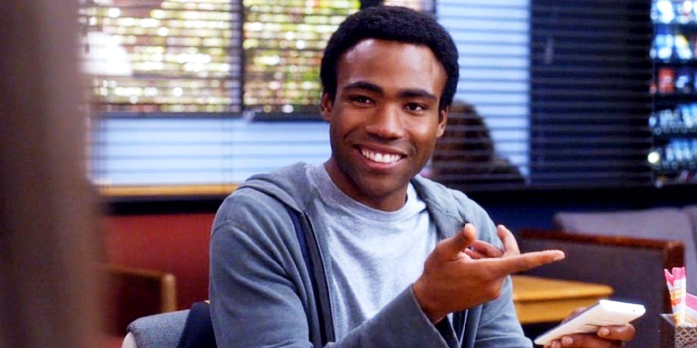 Donald Glover smiling as Troy Barnes in Community season 5