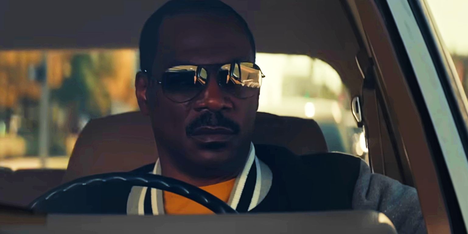 Eddie Murphy as Axel Foley driving a car in Beverly Hills Cop Axel F