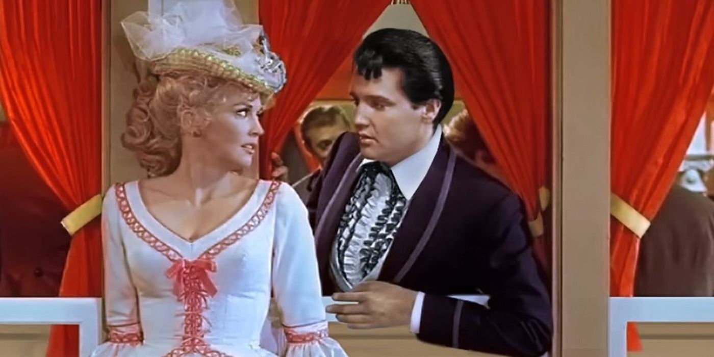 Elvis Presley and Donna Douglas in Frankie And Johnny, looking at one another.