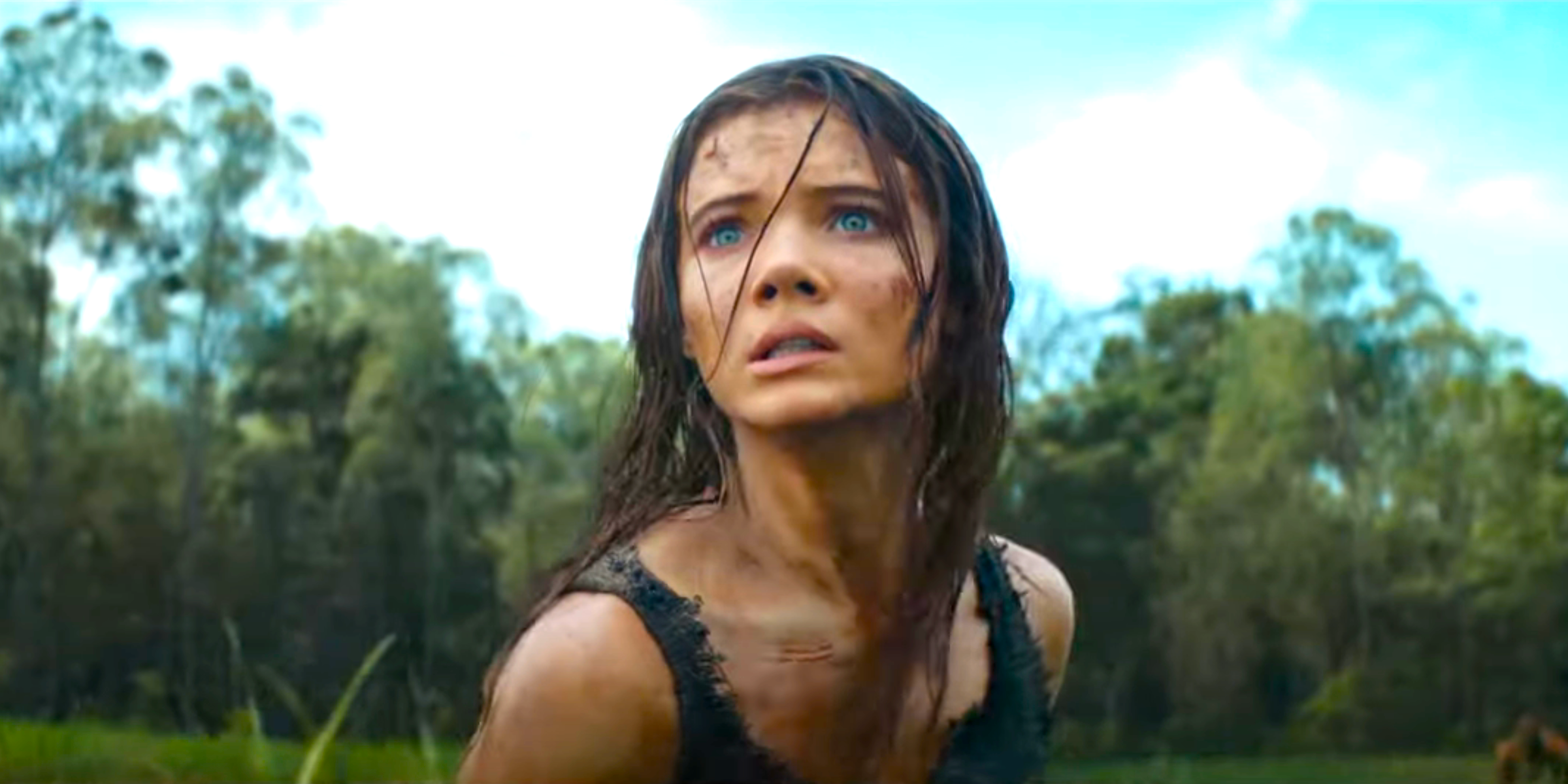 Freya Allan as Mae stares into the distance in Kingdom of the Planet of the Apes