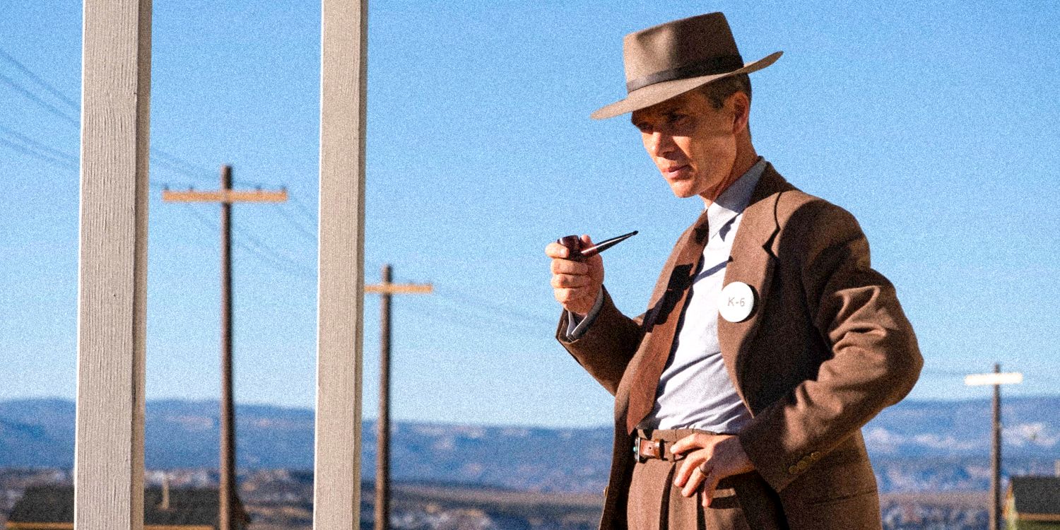 Cillian Murphy as J. Robert Oppenheimer in Oppenheimer holding his pipe