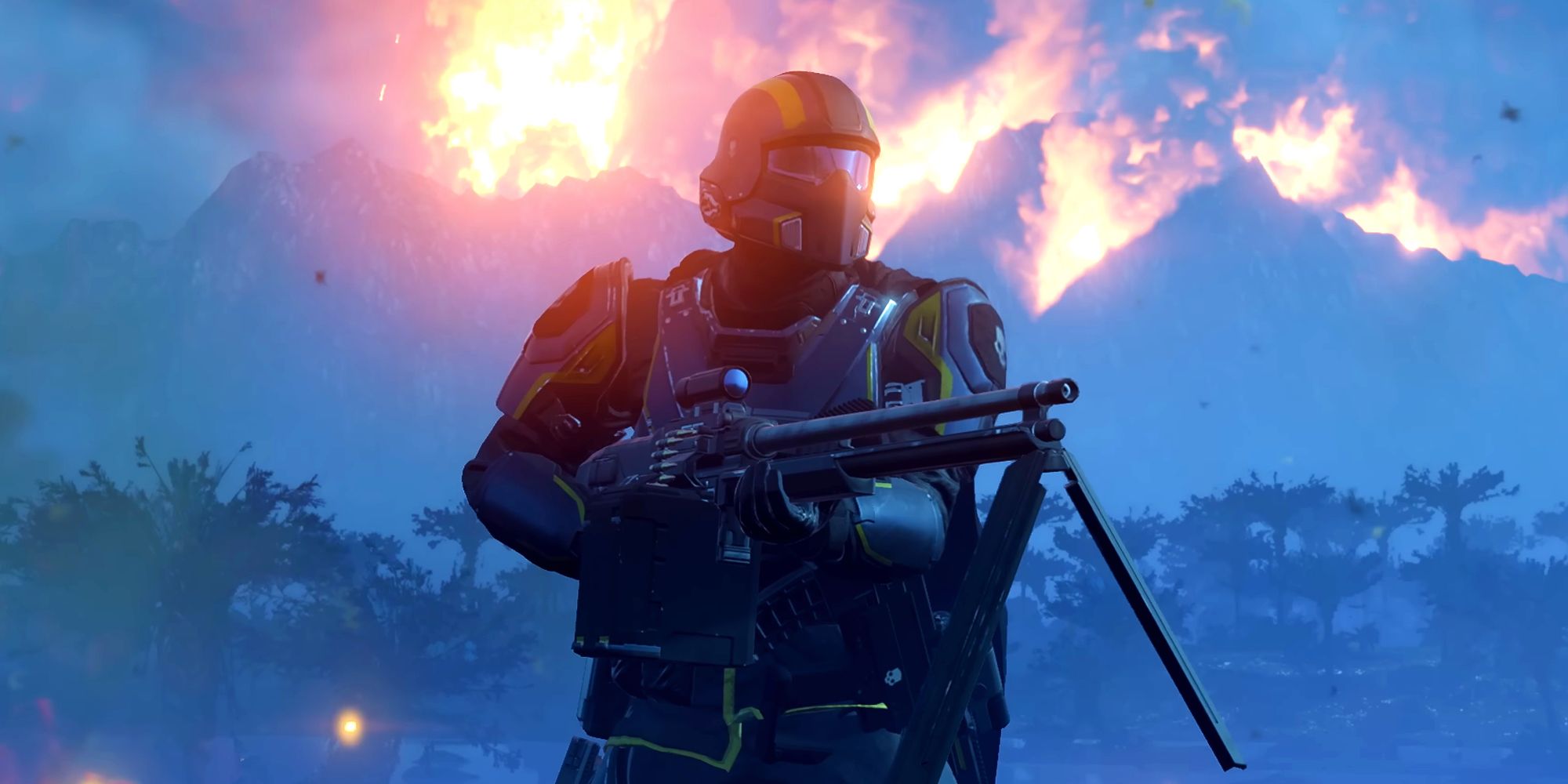A heavily armored sci-fi soldier is holding a heavy machine gun. Behind them is a forest and some mountains covered in flames.