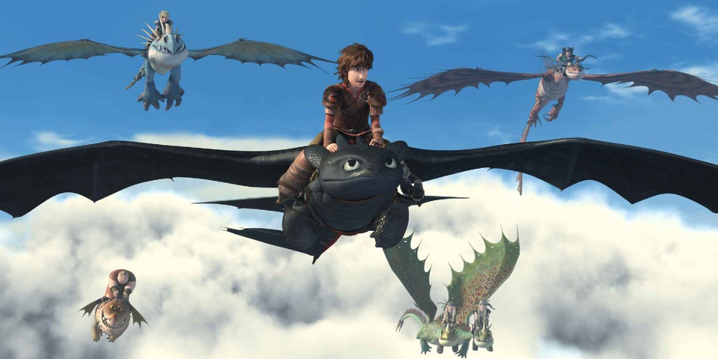 Hiccup, Toothless and other dragons flying through the sky in How to Train Your Dragon