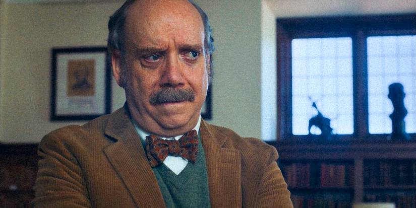 Paul Giamatti as Paul Hunham in The Holdovers close up worried bitting his lip