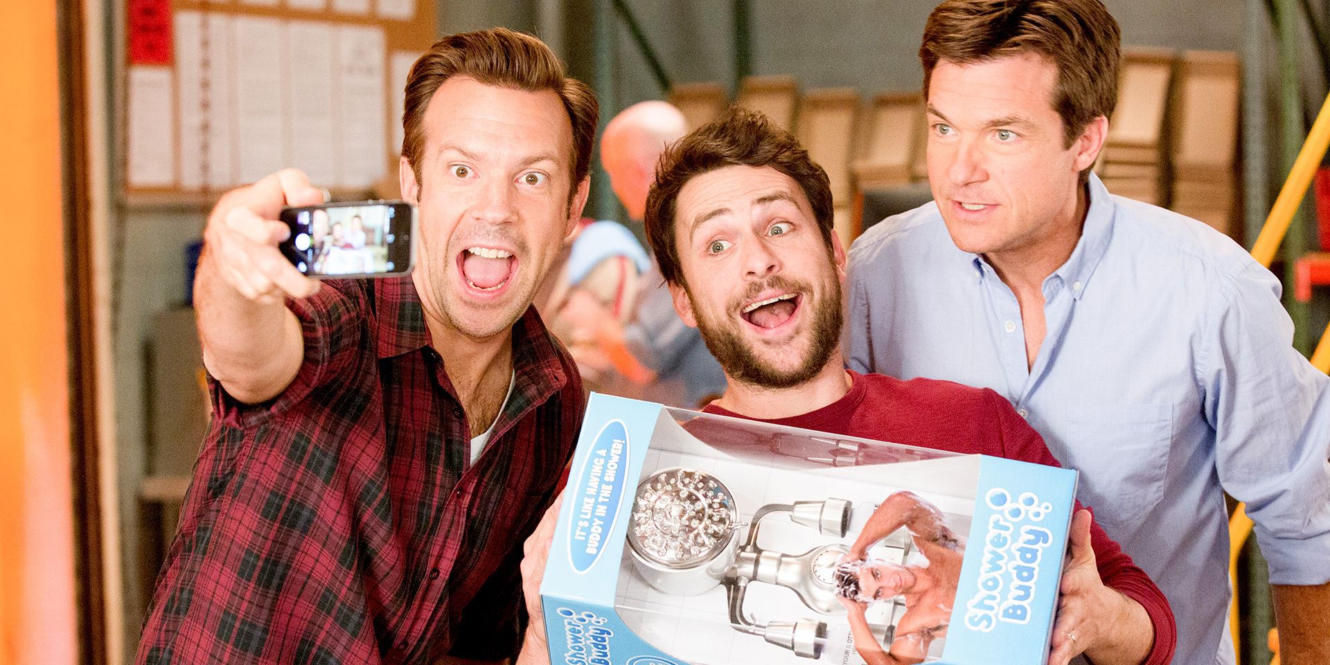 Kurt (Jason Sudeikis), Dale (Charlie Day) and Nick (Jason Bateman) take a selfie posing with the Shower Buddy in Horrible Bosses 2.