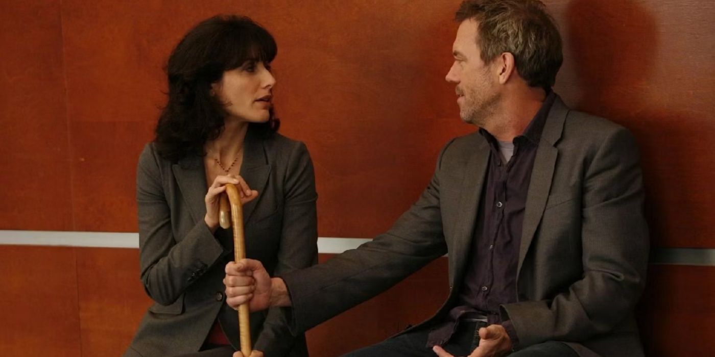 House and Cuddy sitting with the cane