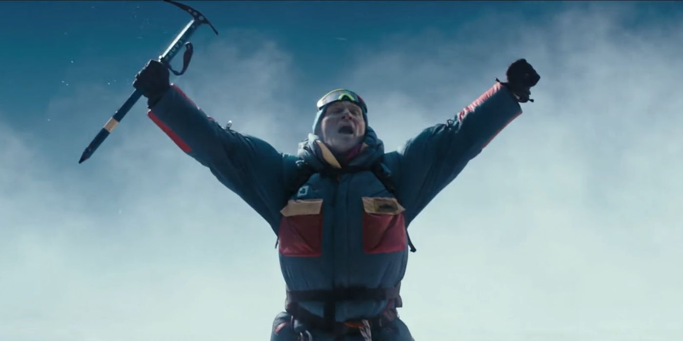 Ingvar Eggert Sigurðsson as Anatoli Boukreev with his arms in the air in Everest.