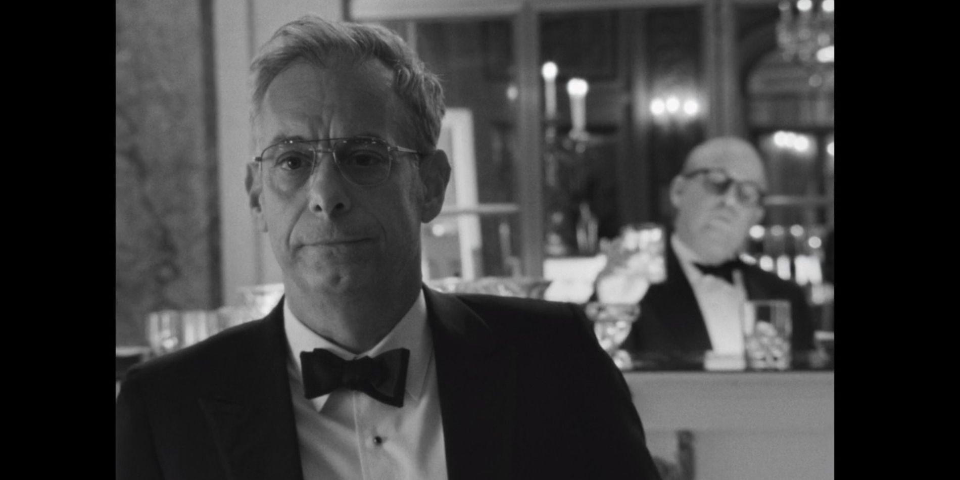 Jack Dunphy With Truman At The Bar In The Background In Feud: Capote Vs. The Swans