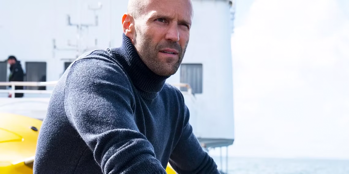 jason-statham-on-a-boat-looking-in-the-distance-in-the-meg