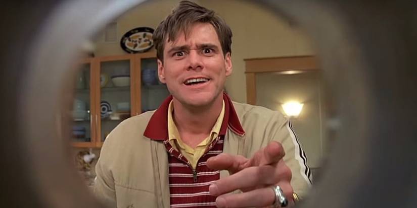 Jim Carrey as Truman Burbank looking and looking in the camera in The Truman Show