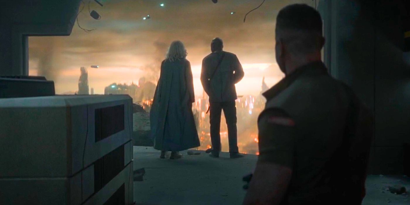 John (Pablo Schreiber) looks on as Dr. Halsey (Natascha McElhone) and Soren (Bokeem Woodbine) look at a destroyed Reach in Halo season 2