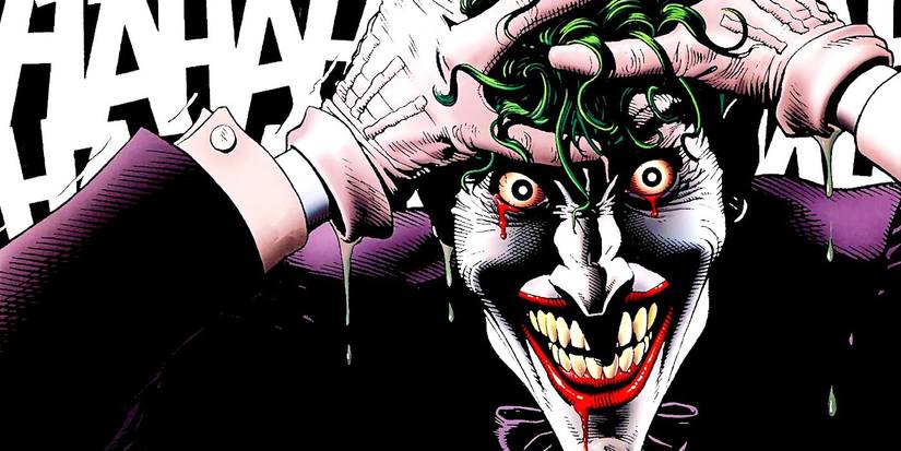 Comic book art: Joker clutching his head and laughing in iconic image from The Killing Joke.
