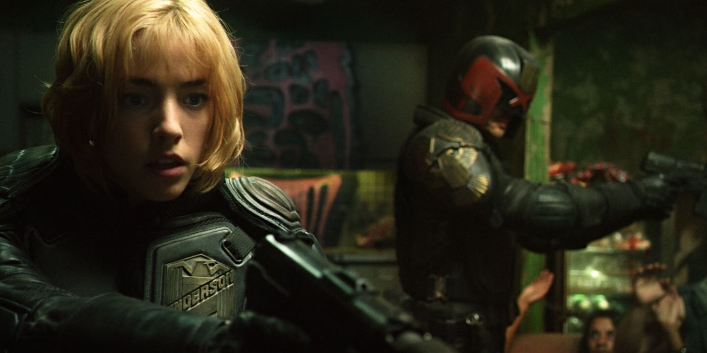 Karl Urban as Judge Dredd and Olivia Thirlby as Judge Anderson in Dredd (2012)