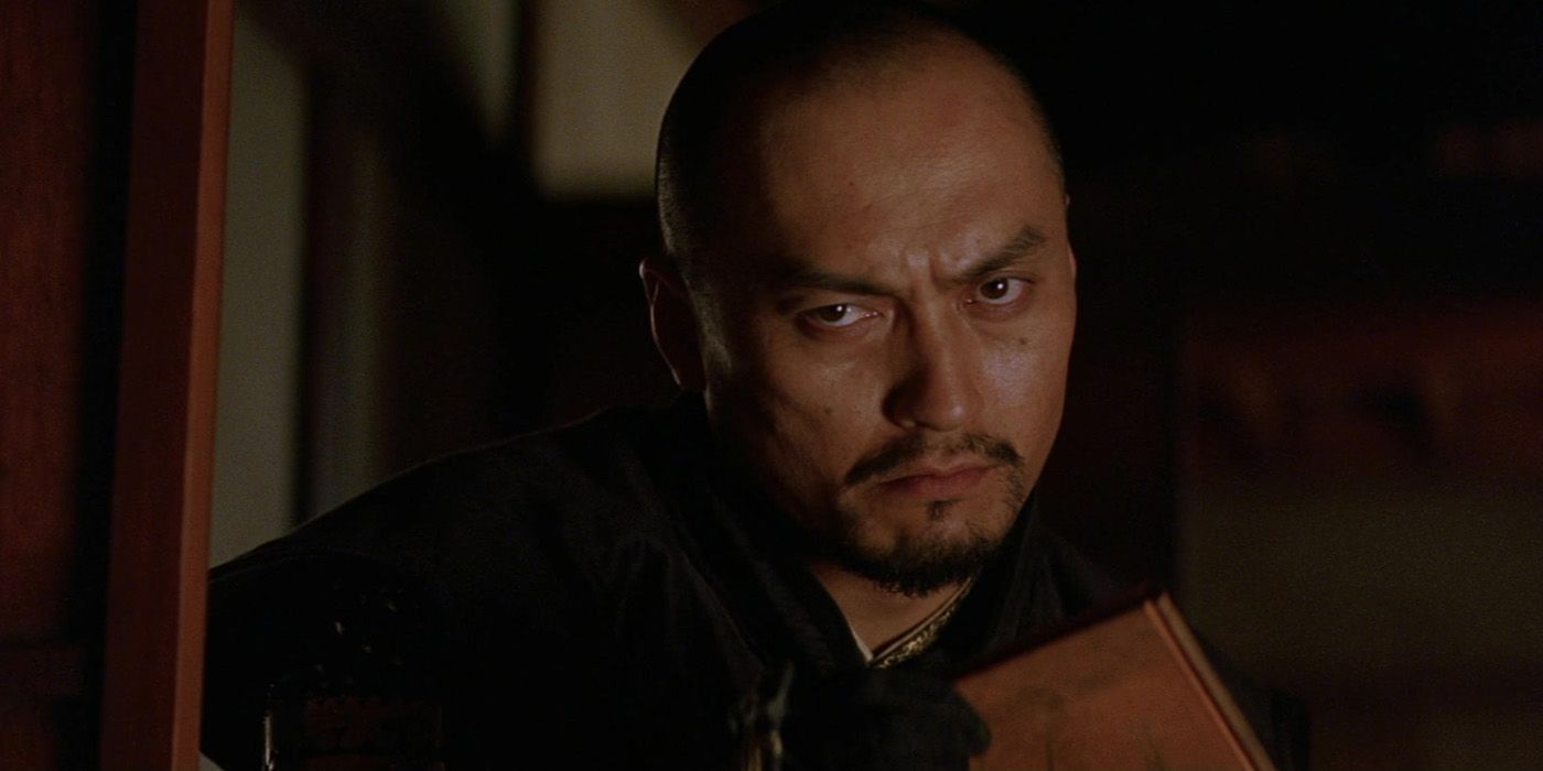 Katsumoto Moritsugu (Ken Watanabe) looking at Nathan's journal in The Last Samurai